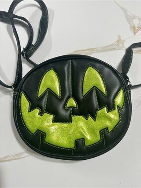 Love pain & stitches pumpkin cult double sided green bag